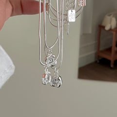 Molten Gleam · Square Zirconia Pendant Necklace