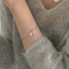 Morning Waltz · Bow-Knot Silver Bracelet