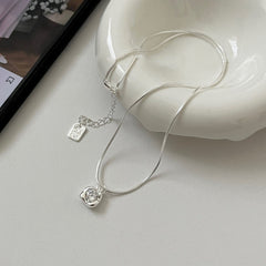 Molten Gleam · Square Zirconia Pendant Necklace