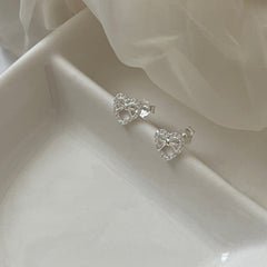 Heart's Whisper · Silver Bow Stud Earrings