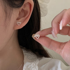 Heart's Whisper · Silver Bow Stud Earrings