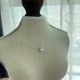 Mermaid’s Tear · Invisible Thread Teardrop Necklace