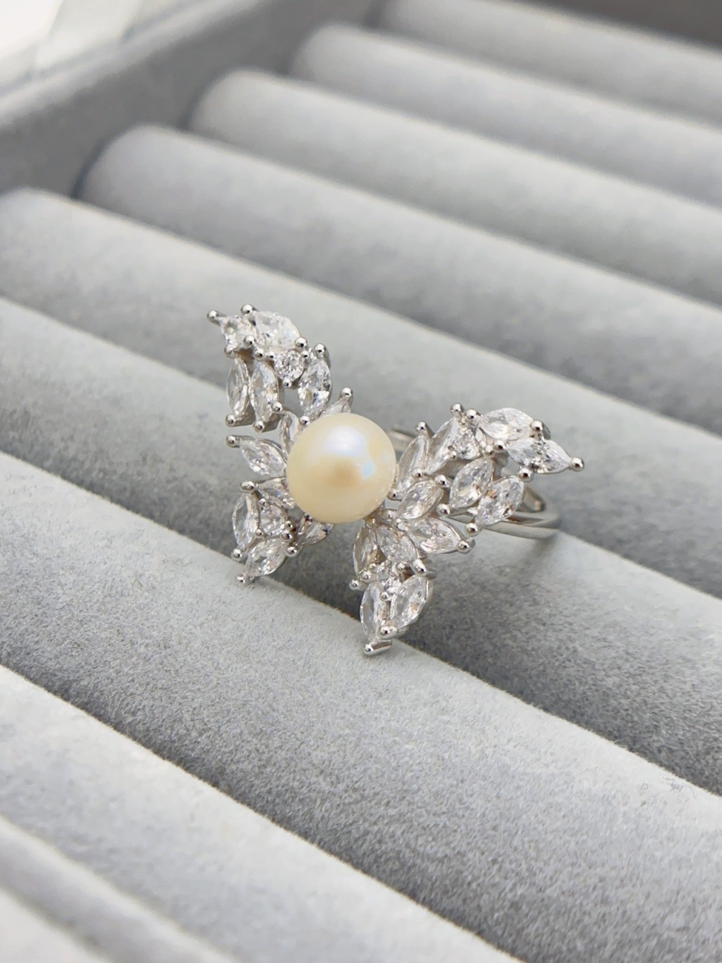 Whispering Wings · Pearl & Zircon Ring