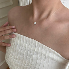 Mermaid’s Tear · Invisible Thread Teardrop Necklace